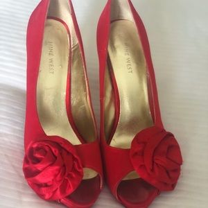 Red Nine West satin evening heels.